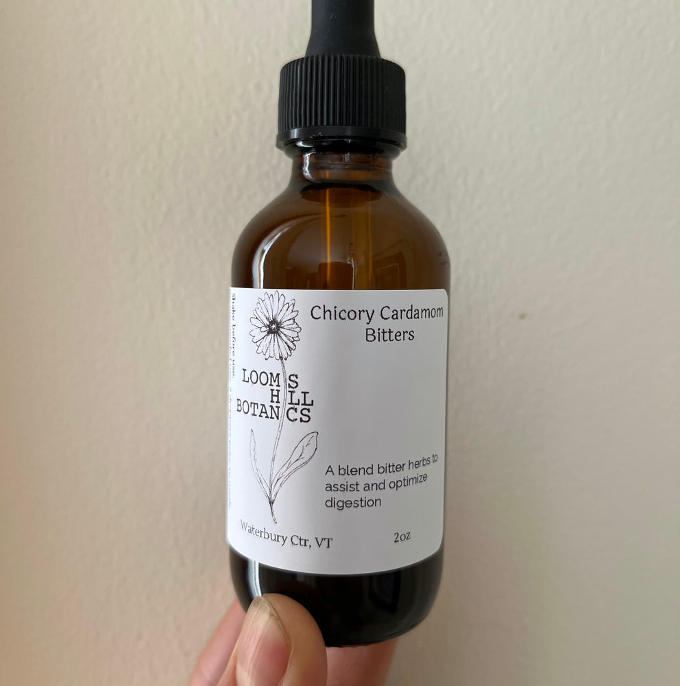 A bottle of Loomis Hill Botanicals chicory cardamom bitters.